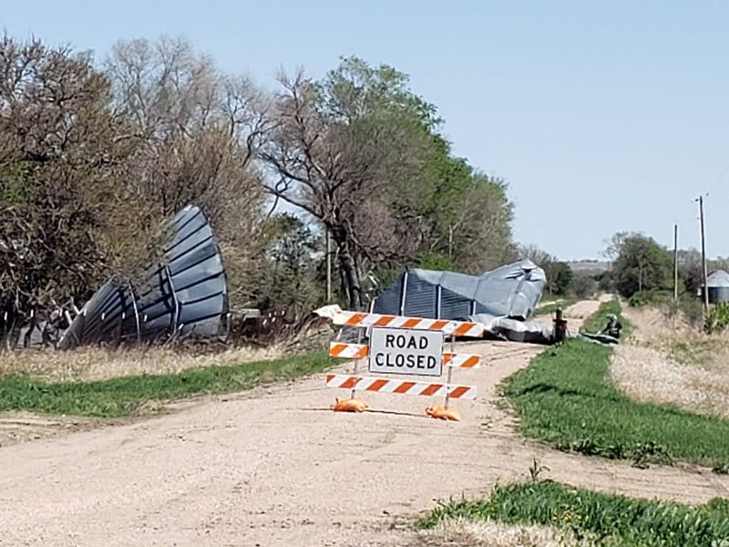 Dust storm, hurricane-force winds tear destructive path across U.S. upper Midwest