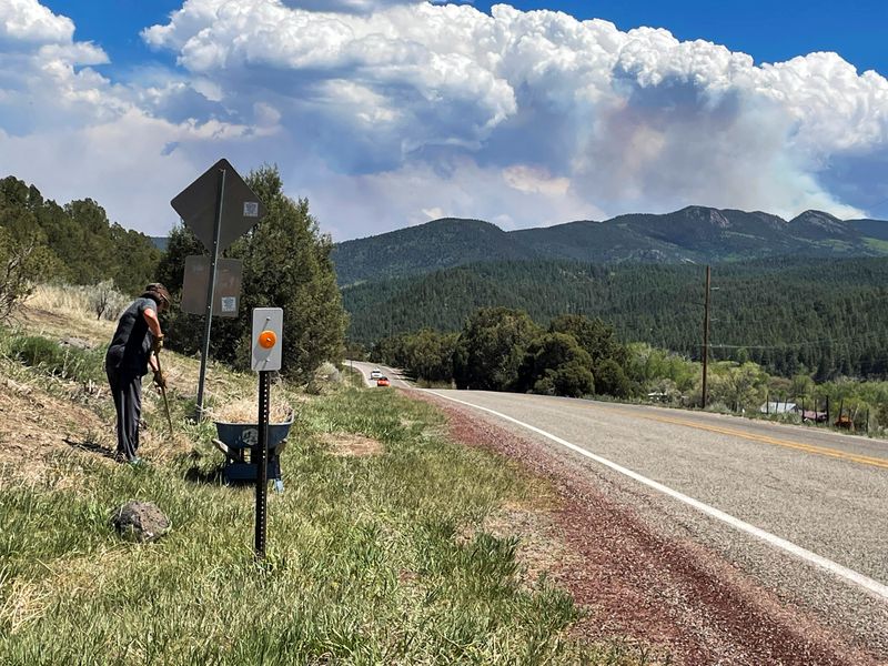With rakes and bulldozers, New Mexico battles 'beast' wildfire
