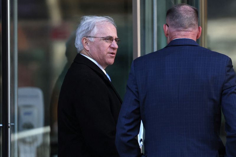 Ex-U.S. congressman denies trading on inside info about T-Mobile merger