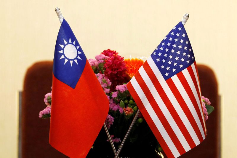 Biden signs law implementing first part of U.S. trade pact with Taiwan