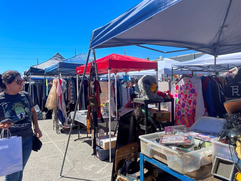 Hollywood workers resort to flea markets, bake sales as strikes drag on