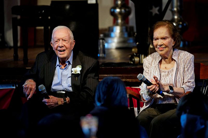 Former President Jimmy Carter rides through Georgia peanut fest