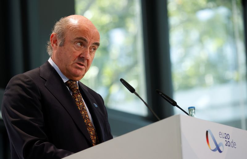 ECB's de Guindos says asset purchases must end before raising rates