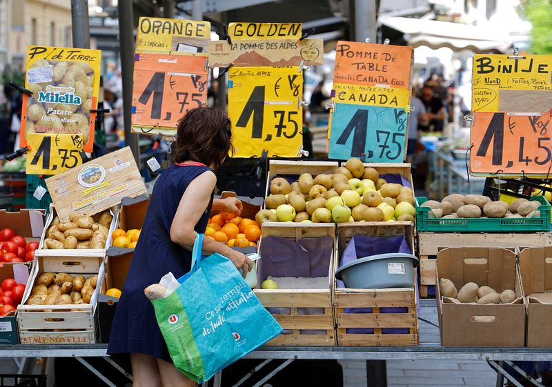 Facing tough vote, France's Macron dangles anti-inflation sweeteners
