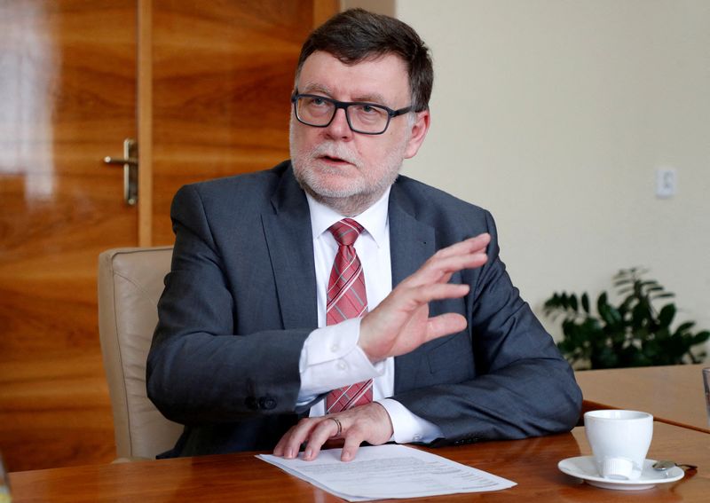 Czech finance minister outlines plan to let firms to pay taxes in euros, look at more euro debt