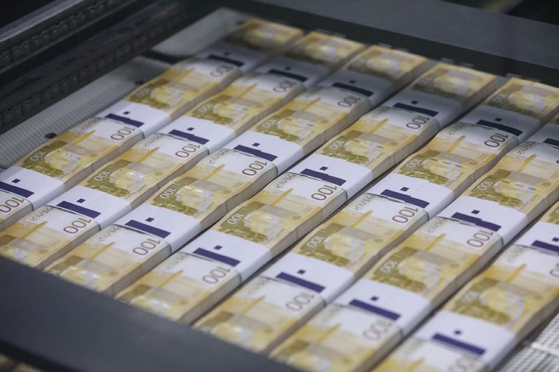 Russian rouble slumps to 3-week low vs dollar, euro