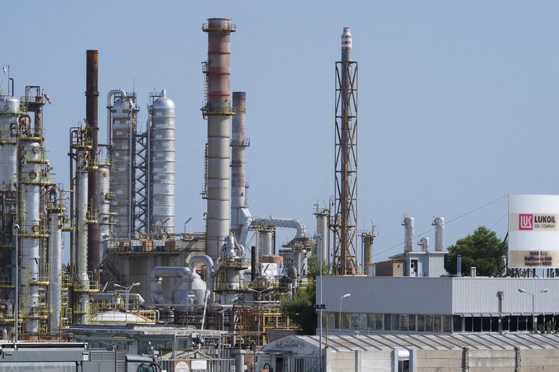 Exclusive-Italy pushes to weaken fossil fuel financing pledge - sources