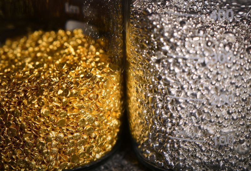 Gold slides on Russia-Ukraine talks, U.S. rate hike bets