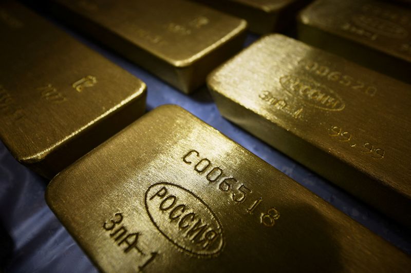 Gold falls 1% after strong U.S. jobs data, firmer dollar