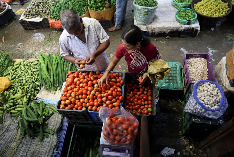 India's July wholesale price index falls less than expected on food prices