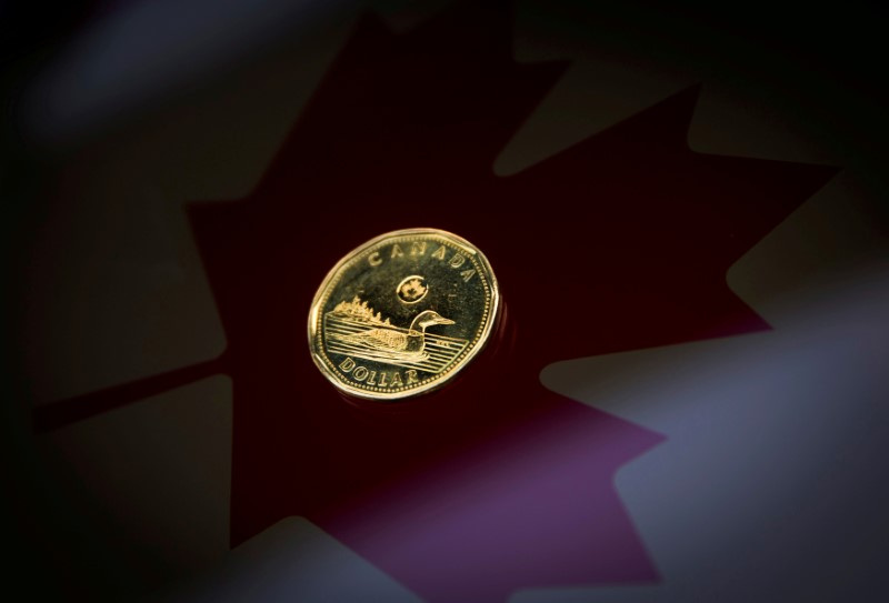 Canadian dollar forecasts turn less bullish as BoC rate cuts eyed: Reuters poll