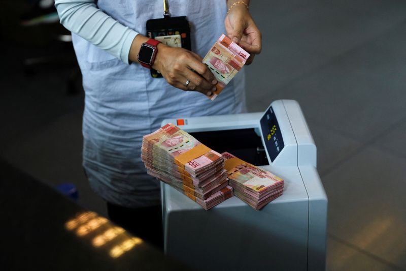 Indonesia central bank intervenes to defend rupiah, open to buying bonds