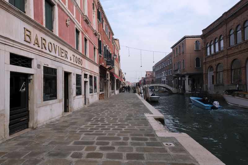 Italy industry minister has no bad-loan proposal in the offing