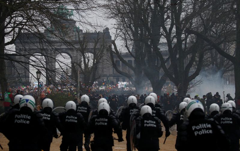 Belgian police fire water cannon, tear gas during COVID curbs protest