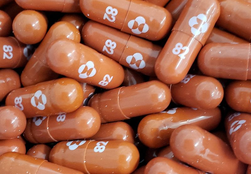 Explainer-How does Merck's COVID-19 pill compare to Pfizer's?