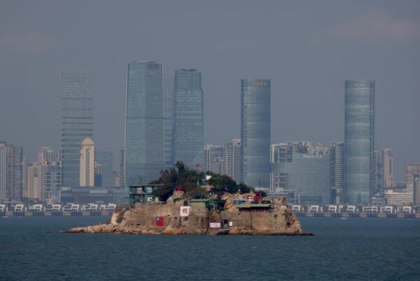 Taiwan says China is too busy with party congress to raise tensions now