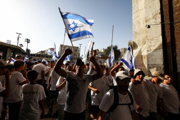 Flag-waving israelis take to streets, skirmishes erupt in al-aqsa mosque