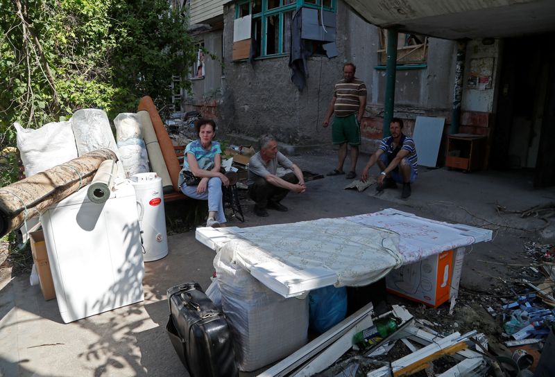 Life in Ukraine's post-siege Mariupol: barter markets and Russian TV