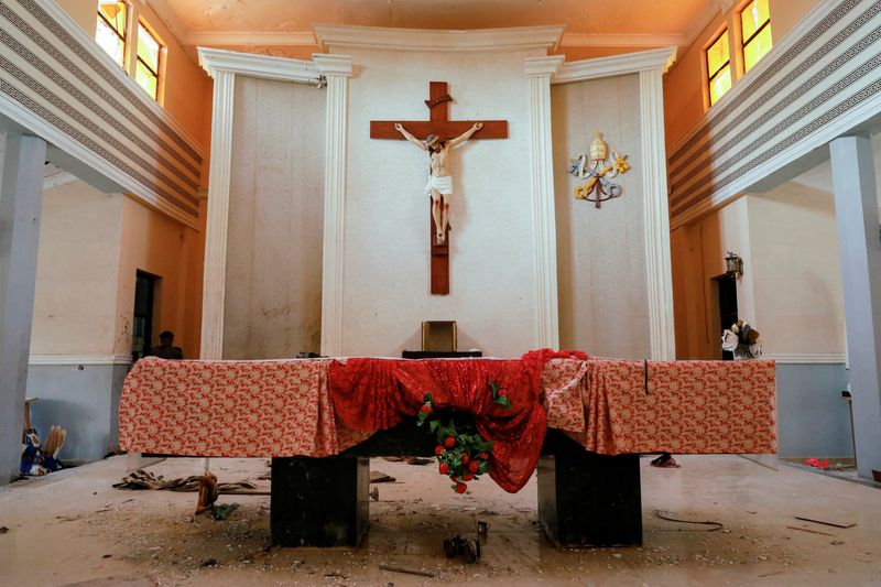 Blood on the church walls - gruesome scenes after Nigeria attack