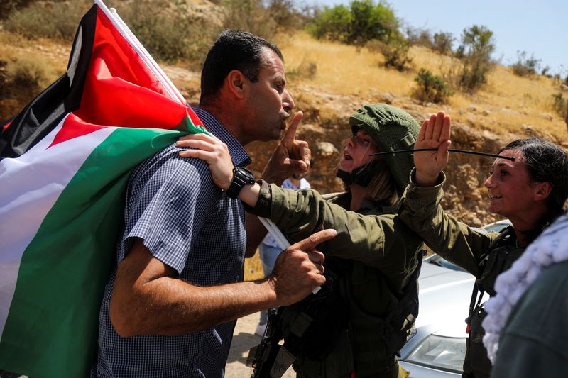 Israeli-Palestinian "flag war" brews as violence flares