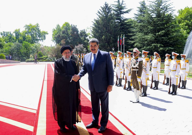 Under U.S. sanctions, Iran and Venezuela sign 20-year cooperation plan