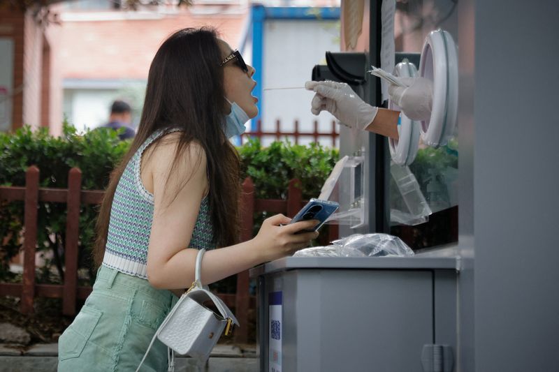 China slashes COVID quarantine time for international travellers