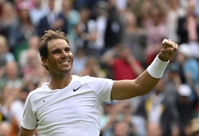 Tennis-Nadal overcomes third set wobble to reach second round