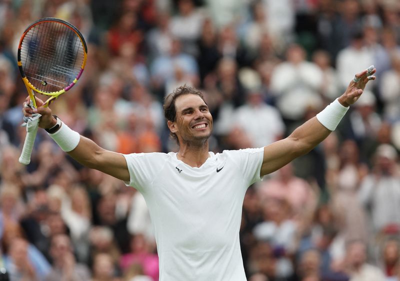 Tennis-Nadal grinds past Berankis into Wimbledon third round