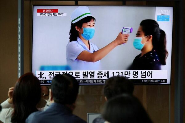 North korea marks end of first covid wave, but risks persist