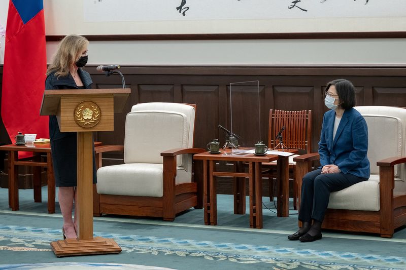 Taiwan president says U.S. visits reinforce island's determination to defend itself
