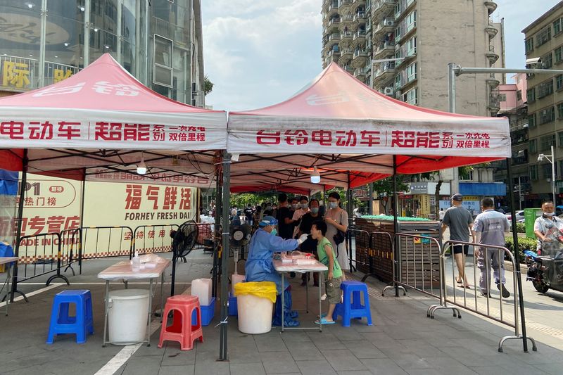 China's big cities, from Dalian to Shenzhen, ramp up COVID curbs
