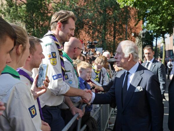 Old and young Britons honour departed Queen, greet new King