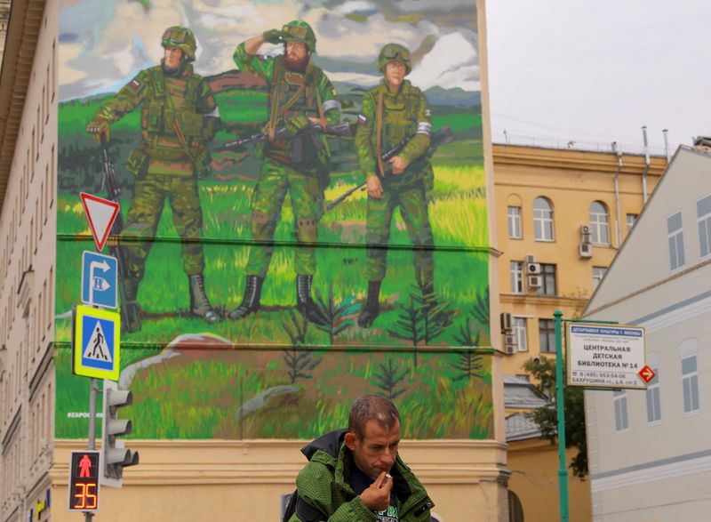 Russian draft prompts exodus by some men as air fares jump