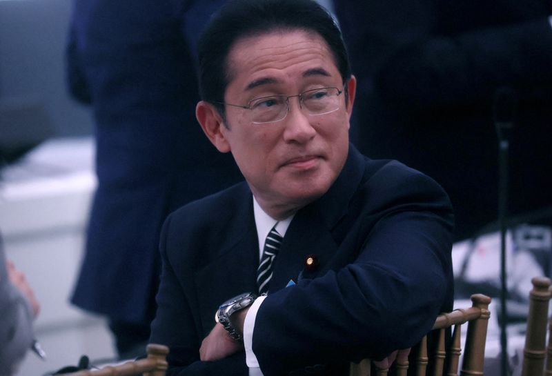 Japan PM says to ease COVID border control requirements next month