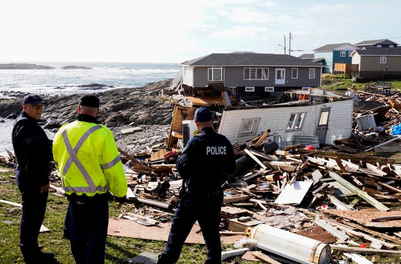 Canadians clean up after Fiona sweeps homes out to sea; one dead