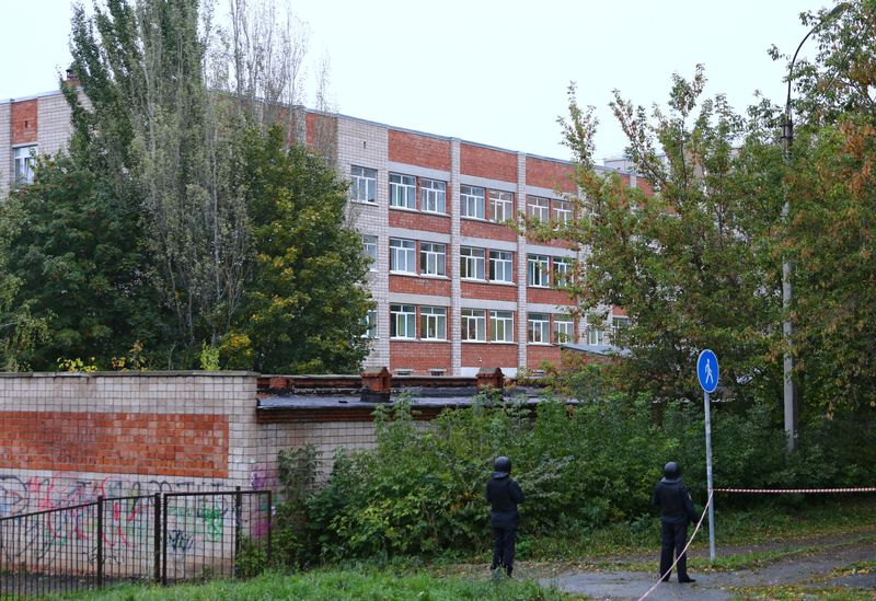 Swastika-wearing ex-pupil kills 15 in Russian school shooting