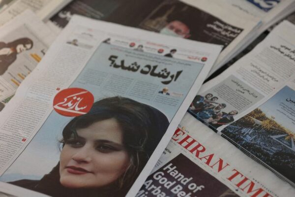 Iran security forces clash with protesters over amini's death