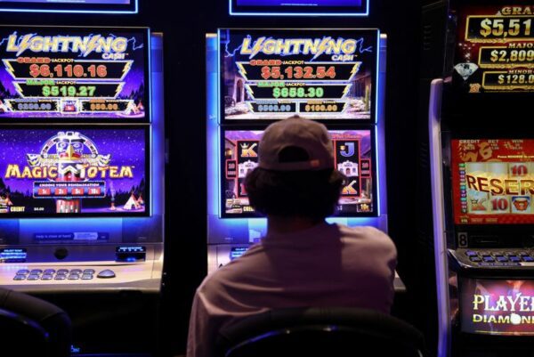 Analysis-slots to smartphones: pandemic sends australia's gambling problem online