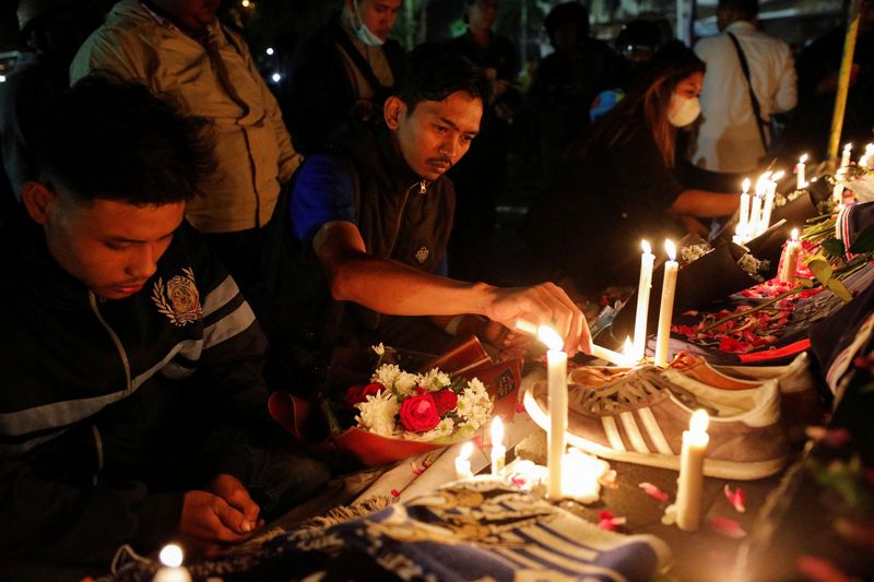 Indonesia soccer stampede kills 125 after police use tear gas in stadium