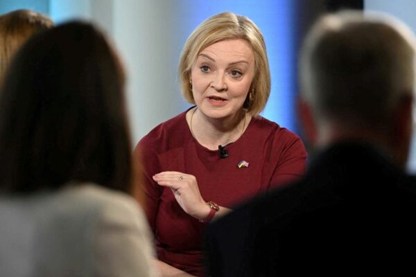 Uk cabinet was not informed of plans to scrap top rate of tax, truss says