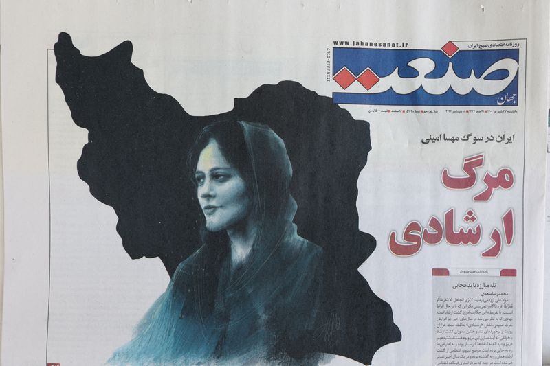 Iranian state coroner says Mahsa Amini did not die from blows to body