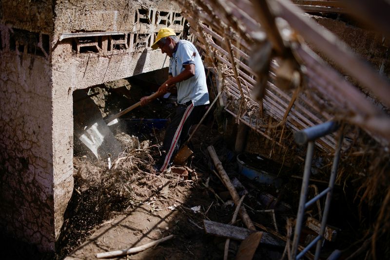 Dozens missing after Venezuela floods, death toll rises