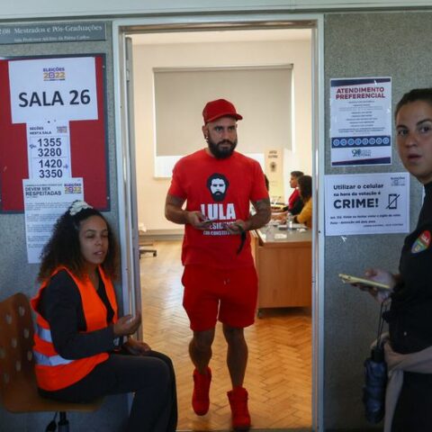 Deeply divided, brazilians abroad join long queues to vote in tense presidential runoff - photo licensed by shore news network.