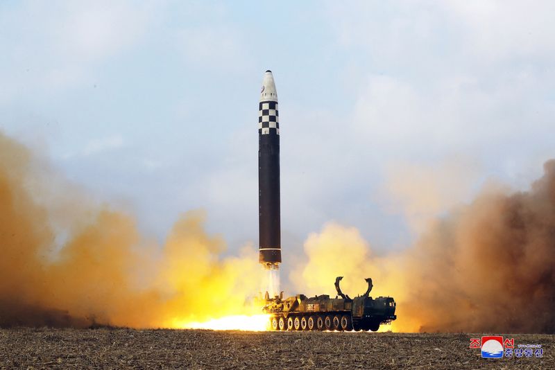 North Korea's Kim oversees ICBM test, vows more nuclear weapons