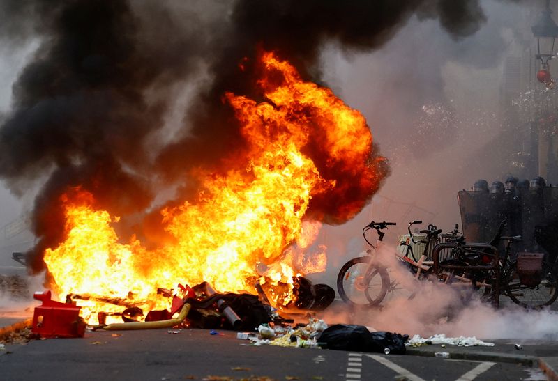 Kurdish protest over Paris shooting turns violent