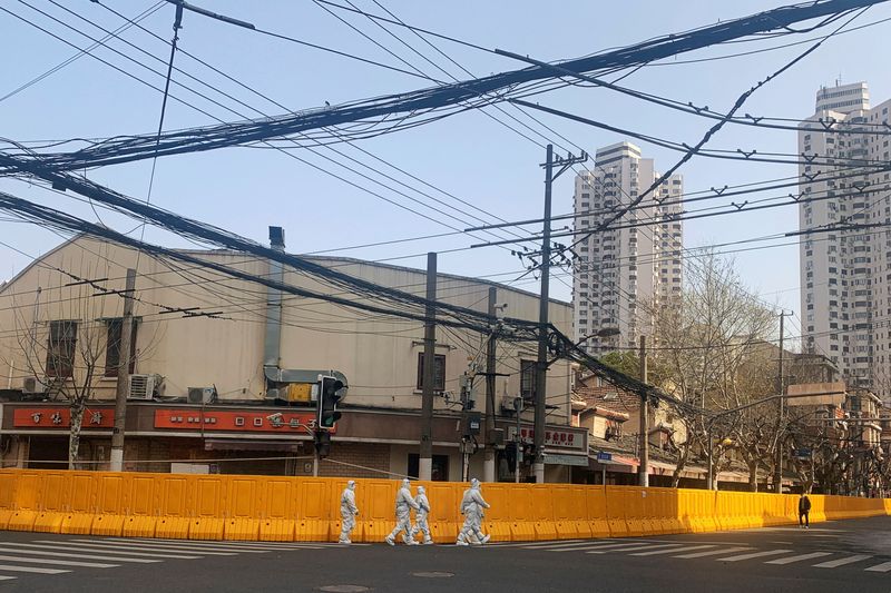 Shanghai's daily COVID caseload at nearly 1,000, but containment in sight