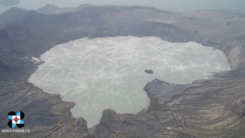 Philippines evacuates residents as small volcano spews mile-high plume