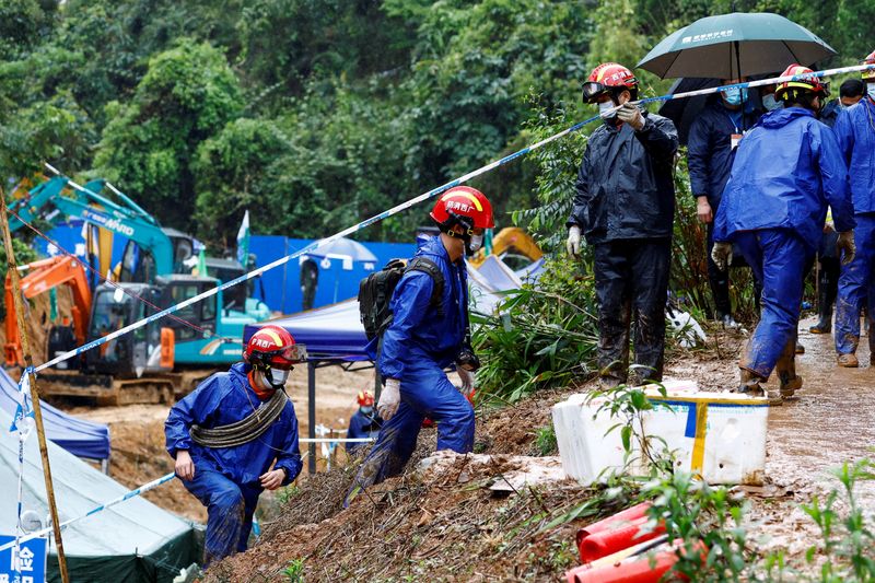 China examines black boxes of crashed jet, looking for more plane debris