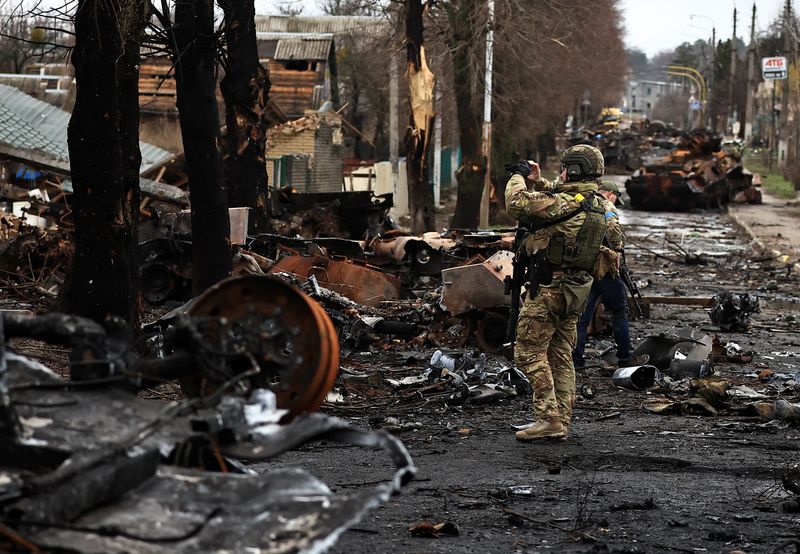 Explainer-How could Russia's Putin be prosecuted for war crimes in Ukraine?