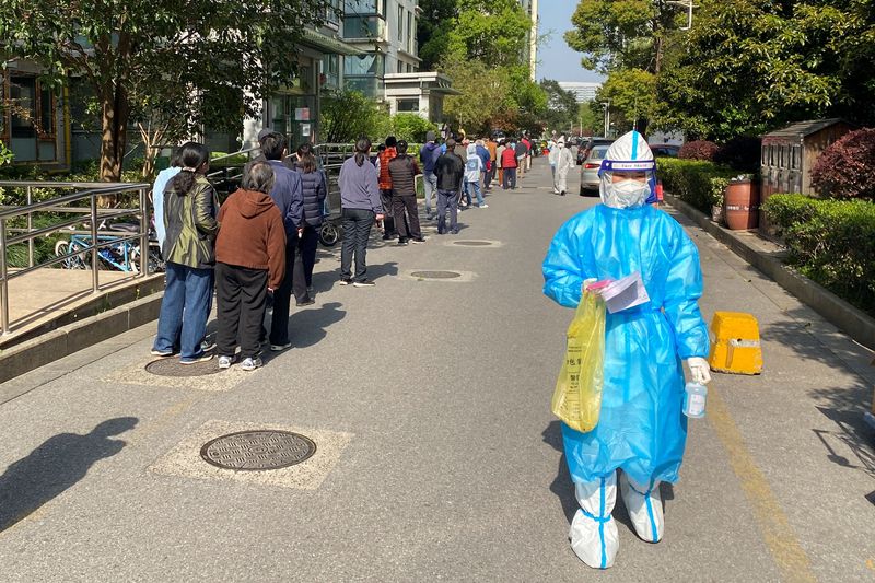 Shanghai carries out more COVID tests as food supply frustrations rise